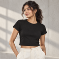 Women’s Fitted Baby Tee — Black on model