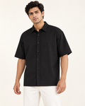 Men’s black oversized cotton shirt on model
