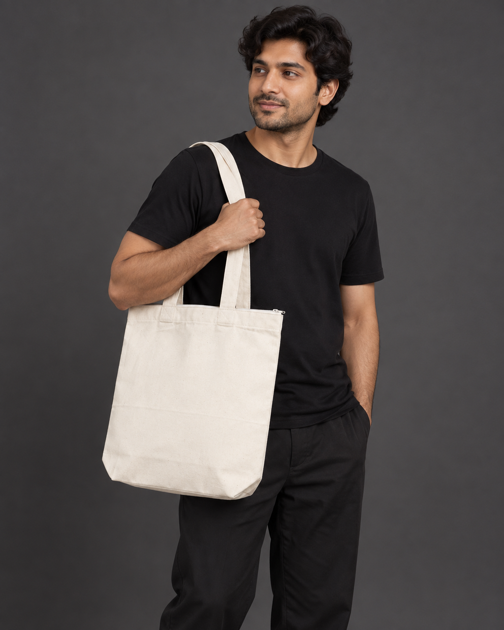 Men’s natural white Qikink cotton canvas zipper tote on model