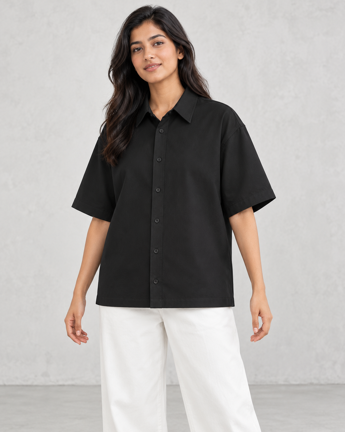 Women’s black oversized cotton shirt on model
