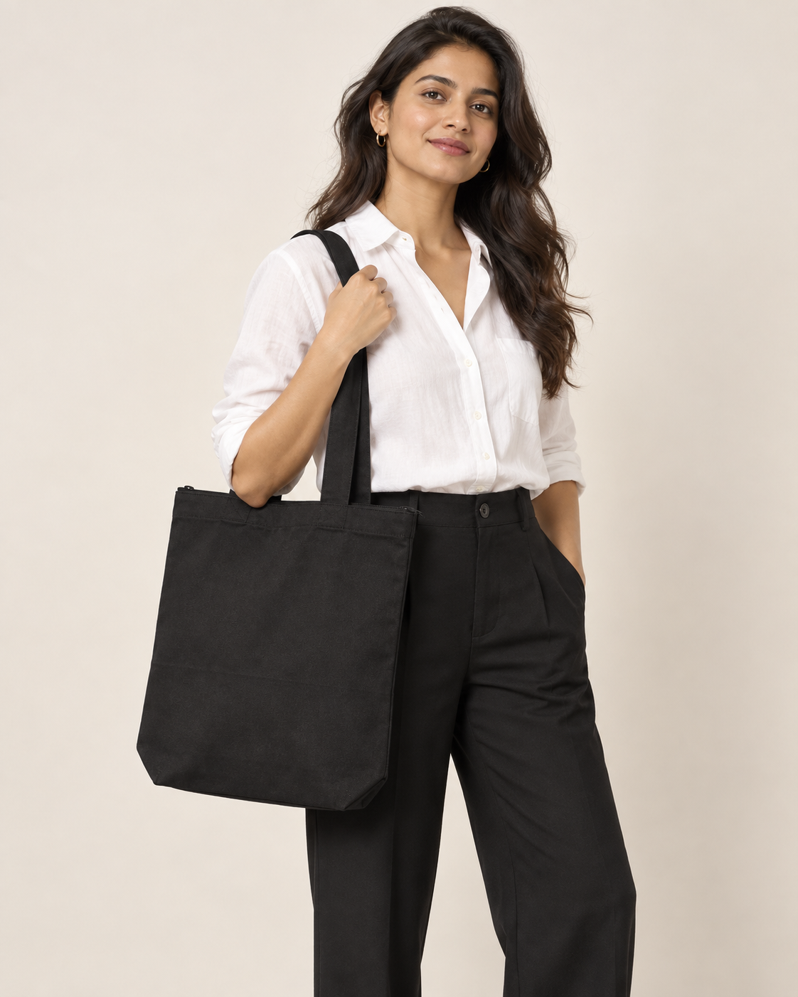 Women’s black Qikink cotton canvas zipper tote on model